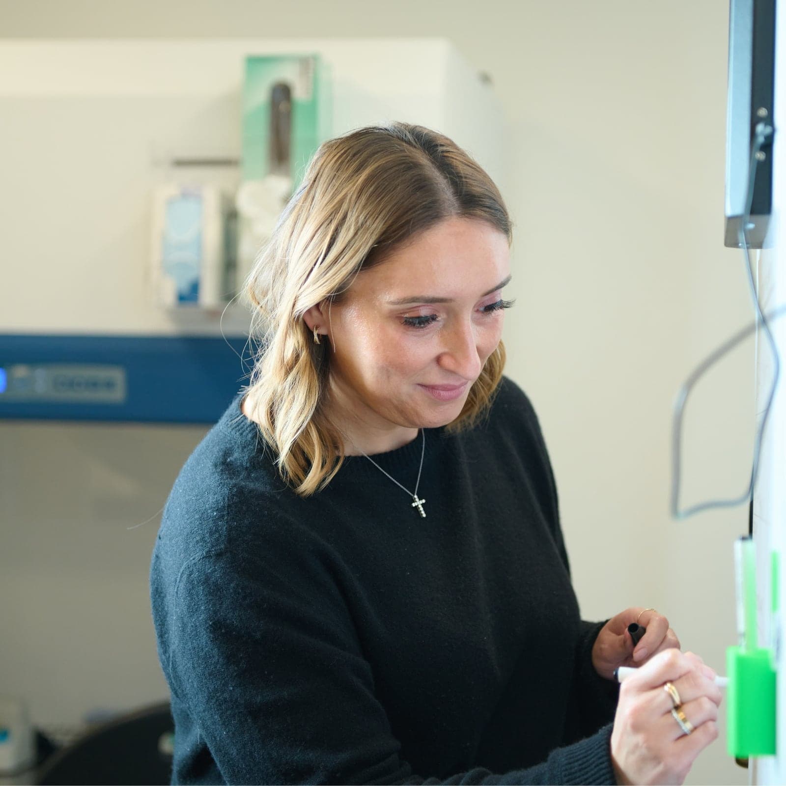 Premier Sperm Bank staff member working in the lab