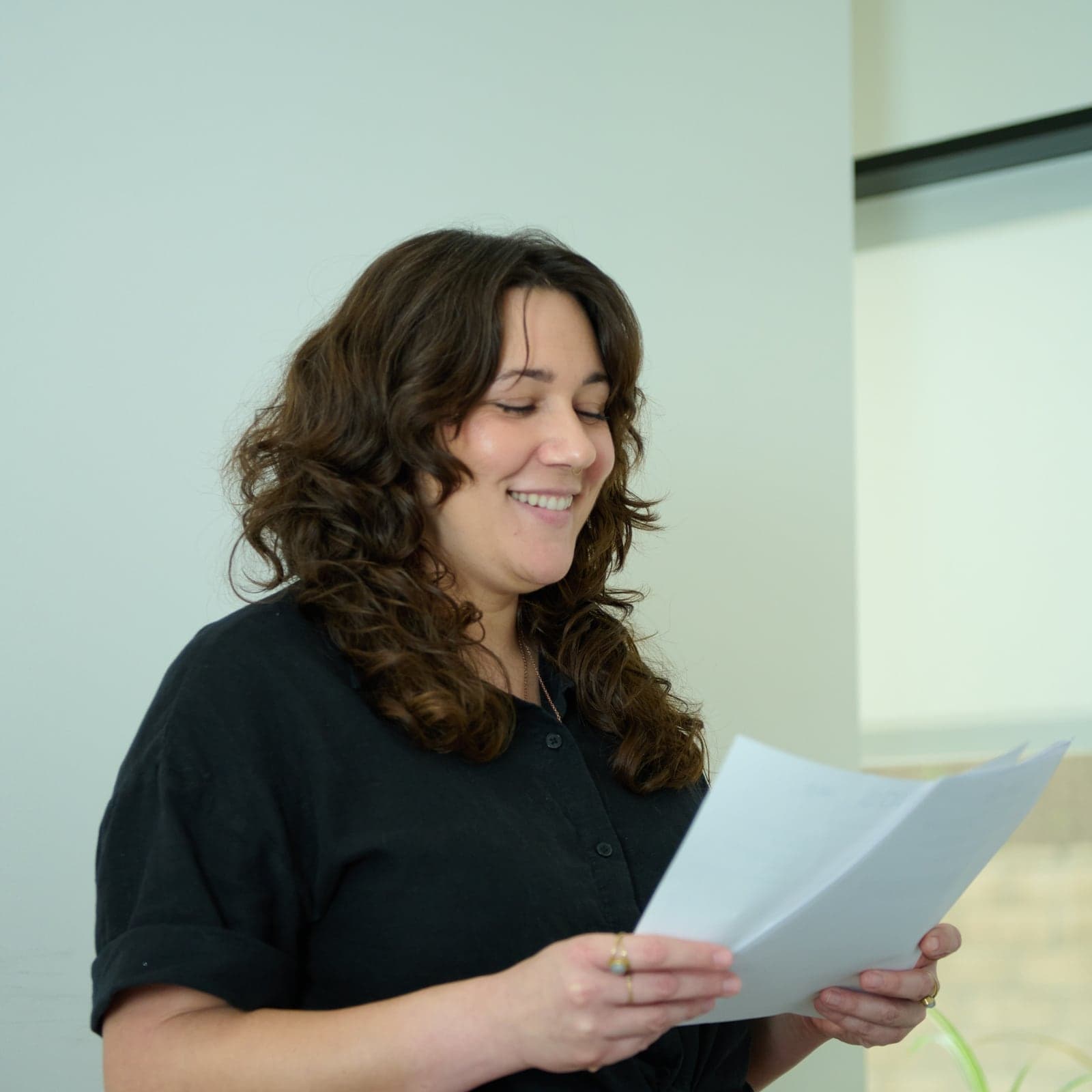 Premier Sperm Bank staff member reviewing documents